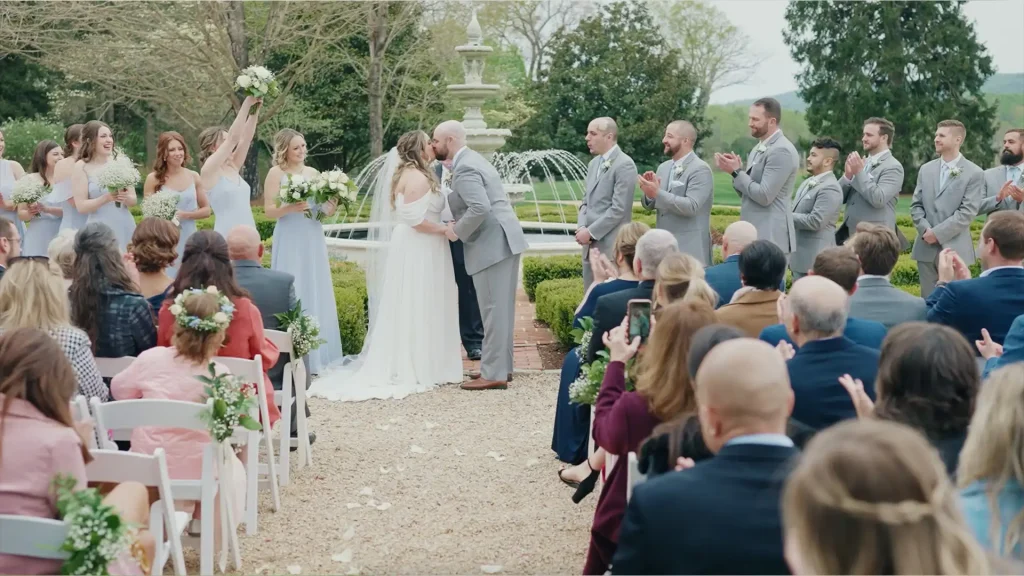 Bride & Groom's ceremony kiss at, Keswick Vineyards
