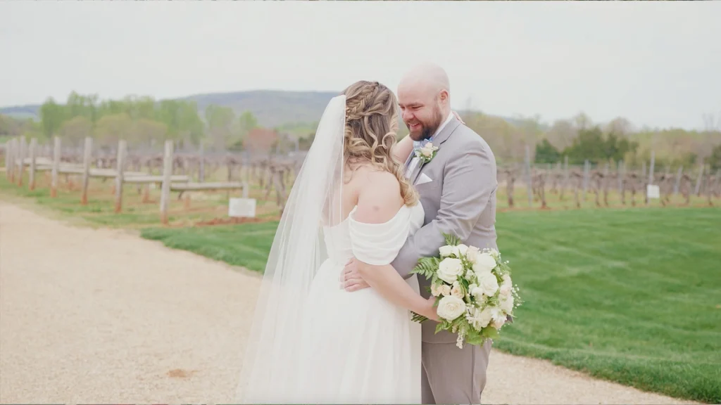 Bride & Groom holding each other at, Keswick Vineyards