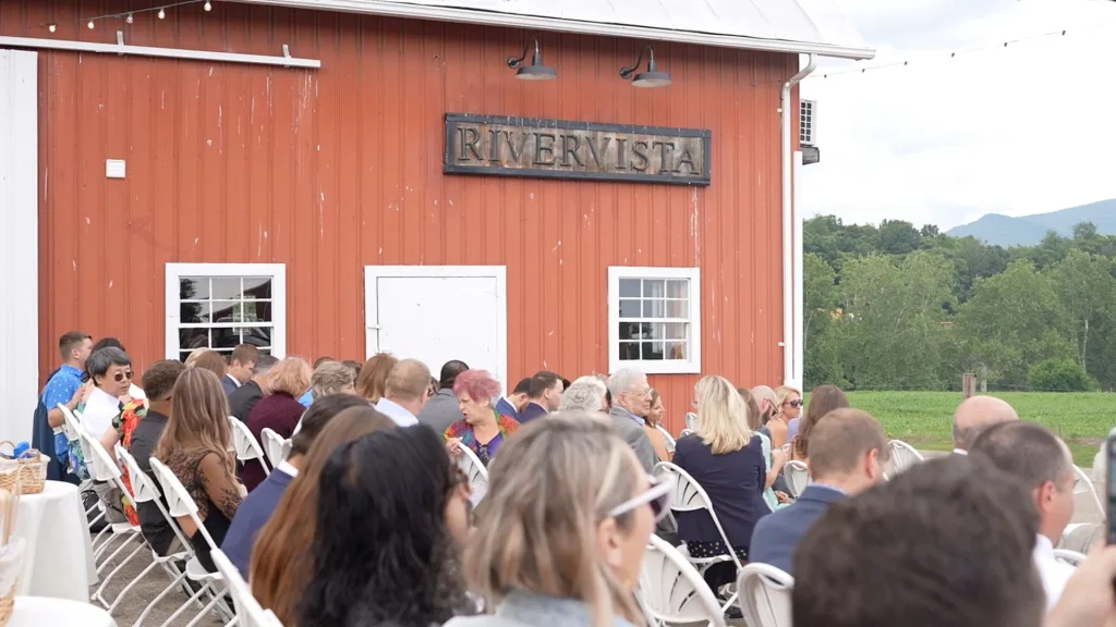 guests sitting in the wedding ceremony space at Rivercrest Farm in Elkton Virginia